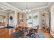 Formal dining room with wood floors and a beautiful display cabinet at 307 Jaida Ln, Oakboro, NC 28129