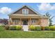 Beautiful home with an attractive front porch and tidy landscaping at 307 Jaida Ln, Oakboro, NC 28129
