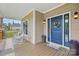 Welcoming front porch with wood floors and inviting rocking chairs at 307 Jaida Ln, Oakboro, NC 28129
