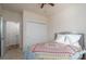 Bedroom with a bed, closet doors, and neutral decor, providing a calm atmosphere at 314 Flat Rock Dr, Denver, NC 28037