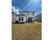 Spacious backyard featuring a patio area with pergola, outdoor furniture, and ample space for recreation at 314 Olympia Way, York, SC 29745