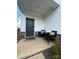 Inviting front porch featuring comfortable seating, stylish brick accents, and an eye-catching welcome mat at 314 Olympia Way, York, SC 29745