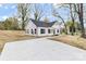 Scenic view of a house from the side, showcasing the lawn and surroundings under a bright sky at 315 Club House Dr, Salisbury, NC 28144