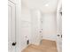 Light and bright laundry room includes storage rack and vinyl floors at 315 Club House Dr, Salisbury, NC 28144