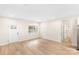 Bright living room with wood-look flooring and natural light, freshly painted at 315 Club House Dr, Salisbury, NC 28144