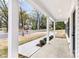 Inviting covered porch with white columns and a view of the neighborhood street at 315 Club House Dr, Salisbury, NC 28144