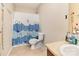 Fun bathroom with a printed shower curtain, toilet and single vanity sink at 3254 Pikes Peak Dr, Gastonia, NC 28052