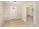 Welcoming foyer with tiled flooring, a white front door, and an open doorway to another room at 3254 Pikes Peak Dr, Gastonia, NC 28052