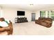Inviting living room with cozy furniture, a large TV, and ample space for relaxation and entertainment at 3254 Pikes Peak Dr, Gastonia, NC 28052