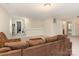 Inviting living room with plush sofa, offering ample space for relaxation and gatherings at 3254 Pikes Peak Dr, Gastonia, NC 28052