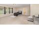 Spacious main bedroom with large windows, a seating area, and a neutral color scheme at 3254 Pikes Peak Dr, Gastonia, NC 28052