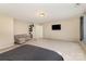 An airy main bedroom features a TV, neutral paint and plush carpet flooring at 3254 Pikes Peak Dr, Gastonia, NC 28052