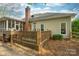 Back of home featuring a deck and a screened-in patio with lovely outdoor space at 3866 Bethany Nw Ct, Concord, NC 28027