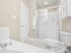 Bathroom featuring tiled shower, toilet, and bathtub at 3866 Bethany Nw Ct, Concord, NC 28027