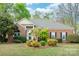 Charming brick home with well-maintained landscaping and mature trees at 3866 Bethany Nw Ct, Concord, NC 28027