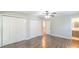 Bright bedroom with ample closet space, wood floors, and en-suite bathroom access at 3921 Bon Rea Dr, Charlotte, NC 28226