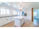 Modern kitchen with a large center island, subway tile backsplash, and stainless steel oven at 3921 Bon Rea Dr, Charlotte, NC 28226