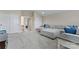 Spacious bonus room features a large sectional sofa, neutral colors, and plenty of room to relax at 400 Eden Hollow Ln, Weddington, NC 28104