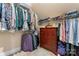 Well-organized walk-in closet with shelving and hanging space for efficient storage and organization at 400 Eden Hollow Ln, Weddington, NC 28104