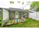 Backyard featuring a fenced patio, small grassy area, and home's exterior with gray siding at 413 Lexie Ln # 92, Rock Hill, SC 29732
