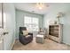 Inviting bedroom with soft colors, comfortable seating, and serene ambiance at 413 Lexie Ln # 92, Rock Hill, SC 29732