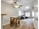 Open dining area with a table and stools, offering views into the living room and kitchen at 413 Lexie Ln # 92, Rock Hill, SC 29732