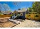 Charming single-story home with a well-manicured lawn, fence, and stylish curb appeal at 4429 Major St, Charlotte, NC 28208