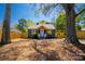 Charming single-story home with a newly landscaped front yard and mature shade trees at 4429 Major St, Charlotte, NC 28208