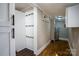 Mudroom with white shiplap and cabinetry, providing storage and organization at 4429 Major St, Charlotte, NC 28208