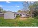 Spacious backyard with deck and light-colored home exterior, perfect for outdoor entertaining at 4541 Bradbury Dr, Charlotte, NC 28209
