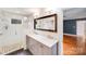 Bathroom with double sinks, granite countertops, glass-enclosed shower and tile at 4541 Bradbury Dr, Charlotte, NC 28209