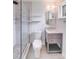 Modern bathroom features a glass-enclosed shower, vanity, and tile floors at 4541 Bradbury Dr, Charlotte, NC 28209