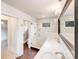 Elegant bathroom with double sinks, granite countertops, and a glass-enclosed shower at 4541 Bradbury Dr, Charlotte, NC 28209