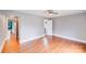 Bedroom displaying hardwood floors and entrance to the hall and other rooms at 4541 Bradbury Dr, Charlotte, NC 28209
