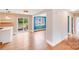 Bright dining room with hardwood floors and sliding doors leading to the backyard at 4541 Bradbury Dr, Charlotte, NC 28209