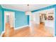 Bright dining room featuring hardwood floors, modern lighting, and seamless kitchen access at 4541 Bradbury Dr, Charlotte, NC 28209