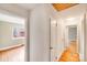 Hallway view showcases hardwood floors and an entry into the bedroom at 4541 Bradbury Dr, Charlotte, NC 28209