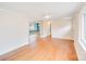 Spacious living room with hardwood floors, neutral walls, and a ceiling fan at 4541 Bradbury Dr, Charlotte, NC 28209