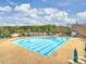 The community pool is a refreshing oasis offering a variety of amenities for residents' enjoyment and relaxation at 516 White Tail Ter, Waxhaw, NC 28173