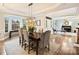 Dining room featuring neutral colors, bay window and modern pendant lighting at 516 White Tail Ter, Waxhaw, NC 28173