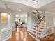 Elegant foyer with hardwood floors, staircase, and views of the living area at 516 White Tail Ter, Waxhaw, NC 28173
