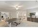 Spacious game room featuring a ping pong table and access to other rooms at 516 White Tail Ter, Waxhaw, NC 28173