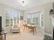 Charming home office with abundant natural light features built-ins and a cozy fireplace, perfect for productivity at 516 White Tail Ter, Waxhaw, NC 28173