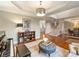 Elegant living room with classic decor, hardwood floors and neutral color palette at 516 White Tail Ter, Waxhaw, NC 28173