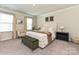 Comfortable bedroom with carpet, natural light, and stylish furnishings, creating a serene retreat at 533 Cedar Knoll Cir, Pineville, NC 28134