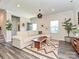 Bright and airy living room with modern decor and hardwood floors at 533 Cedar Knoll Cir, Pineville, NC 28134