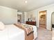 Bright main bedroom boasts crown molding, walk in closet and en suite bath with plentiful natural light at 533 Cedar Knoll Cir, Pineville, NC 28134