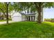 Inviting two-story home with lush green lawn and mature trees at 5549 Lemley Nw Rd, Concord, NC 28027