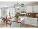 Bright kitchen with granite counters and tile backsplash and stainless steel appliances at 5549 Lemley Nw Rd, Concord, NC 28027