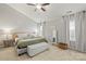 Inviting main bedroom featuring a cozy bed, neutral tones, and natural light from large windows at 5549 Lemley Nw Rd, Concord, NC 28027